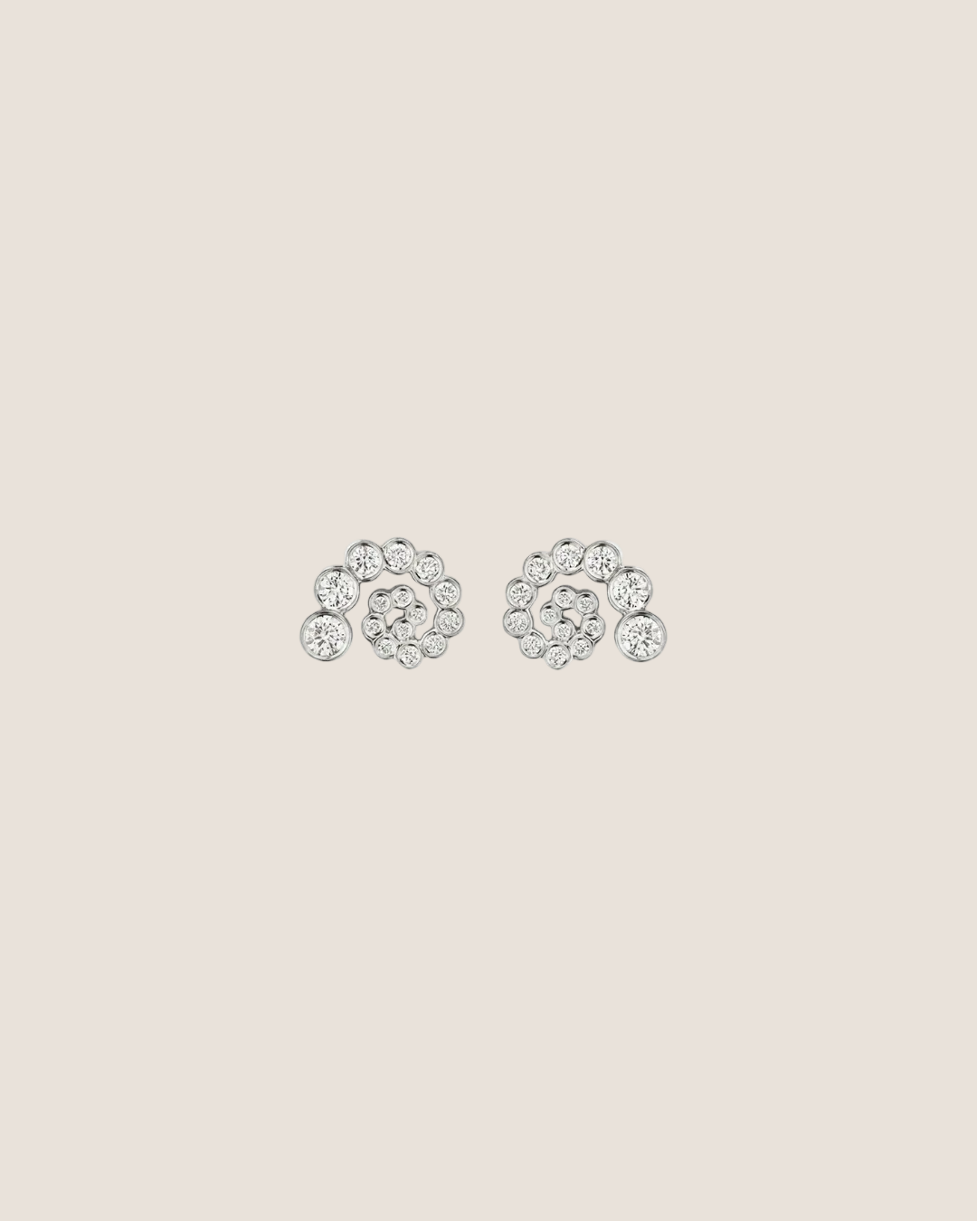Silver earrings in a horseshoe with stones